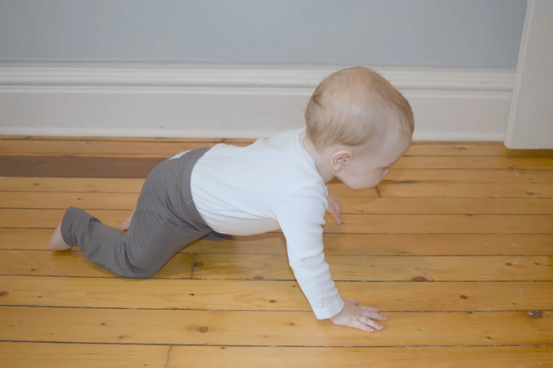 Baby crawling in Go Little One Go pants
